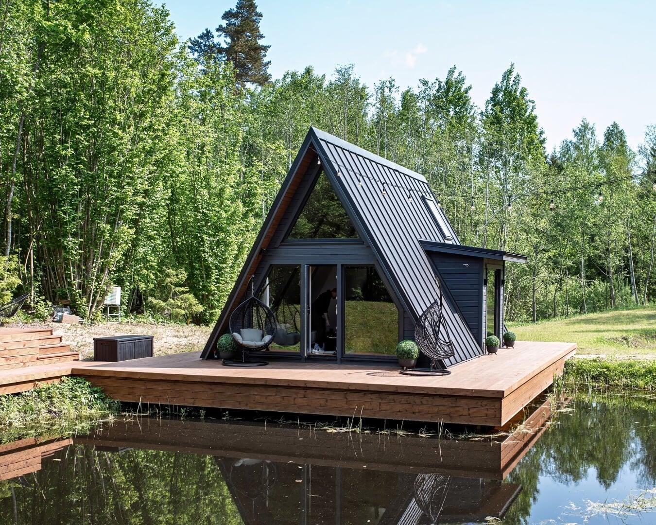 Duo A-frame house surrounded by the green nature